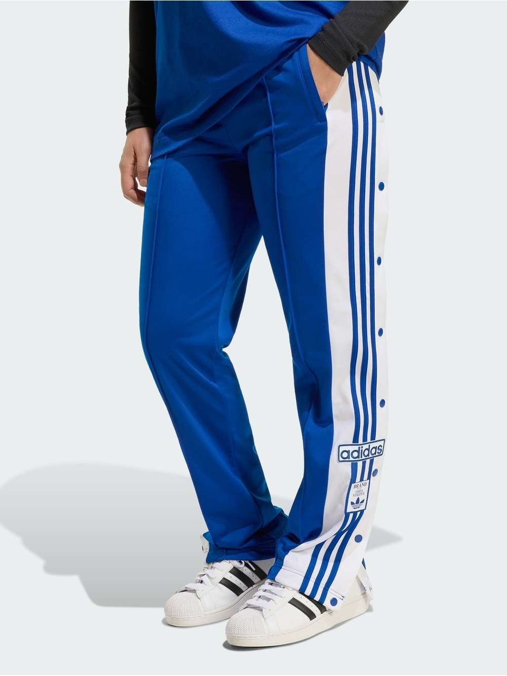 Adidas Blue Track Pants with Classic White Stripes - Picture 7 of 10